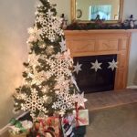 Christmas Tree Next to Fireplace