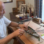 Pine Ridge South Resident Building a Model Boat